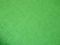 Grüne hessischen Gewebe-Hintergrund