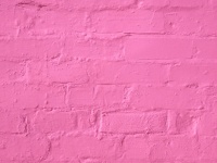 Los ladrillos de color rosa de fondo