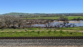 Railroad Tracks In Rural Landscape
