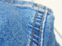 Stitching on blue jeans