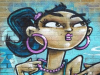 Street Art Graffiti na cihlové zdi