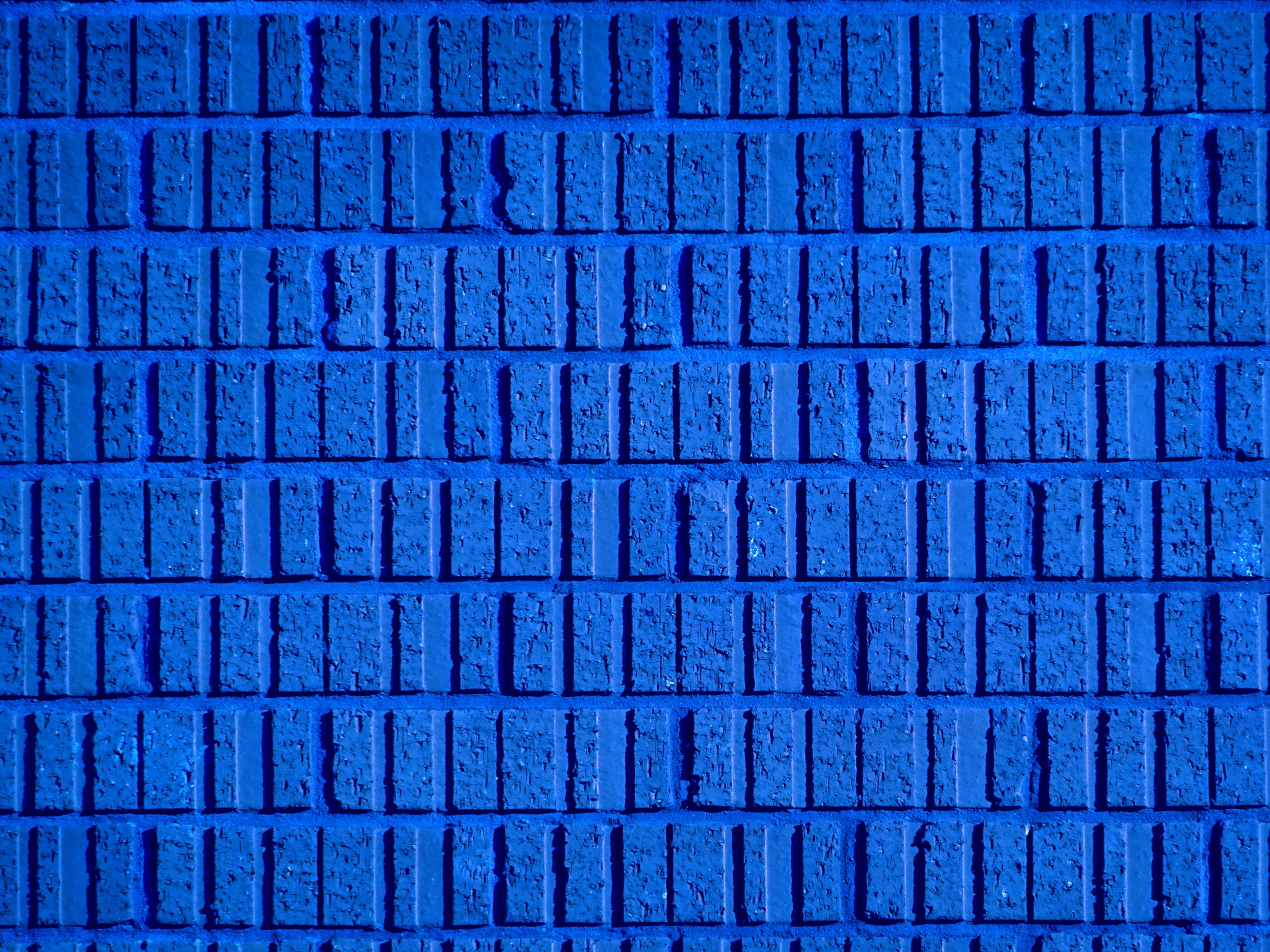Sfondo blu muro di mattoni