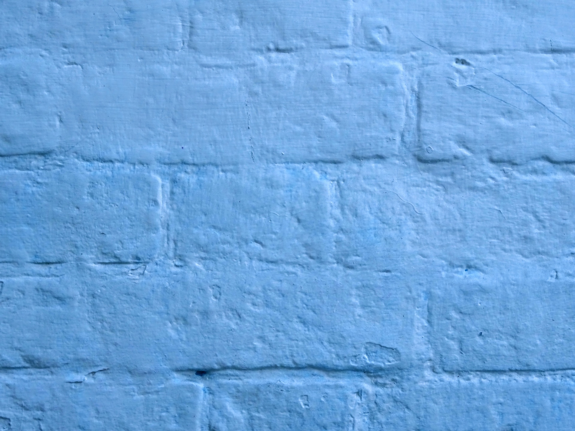 Blu dipinto muro di mattoni