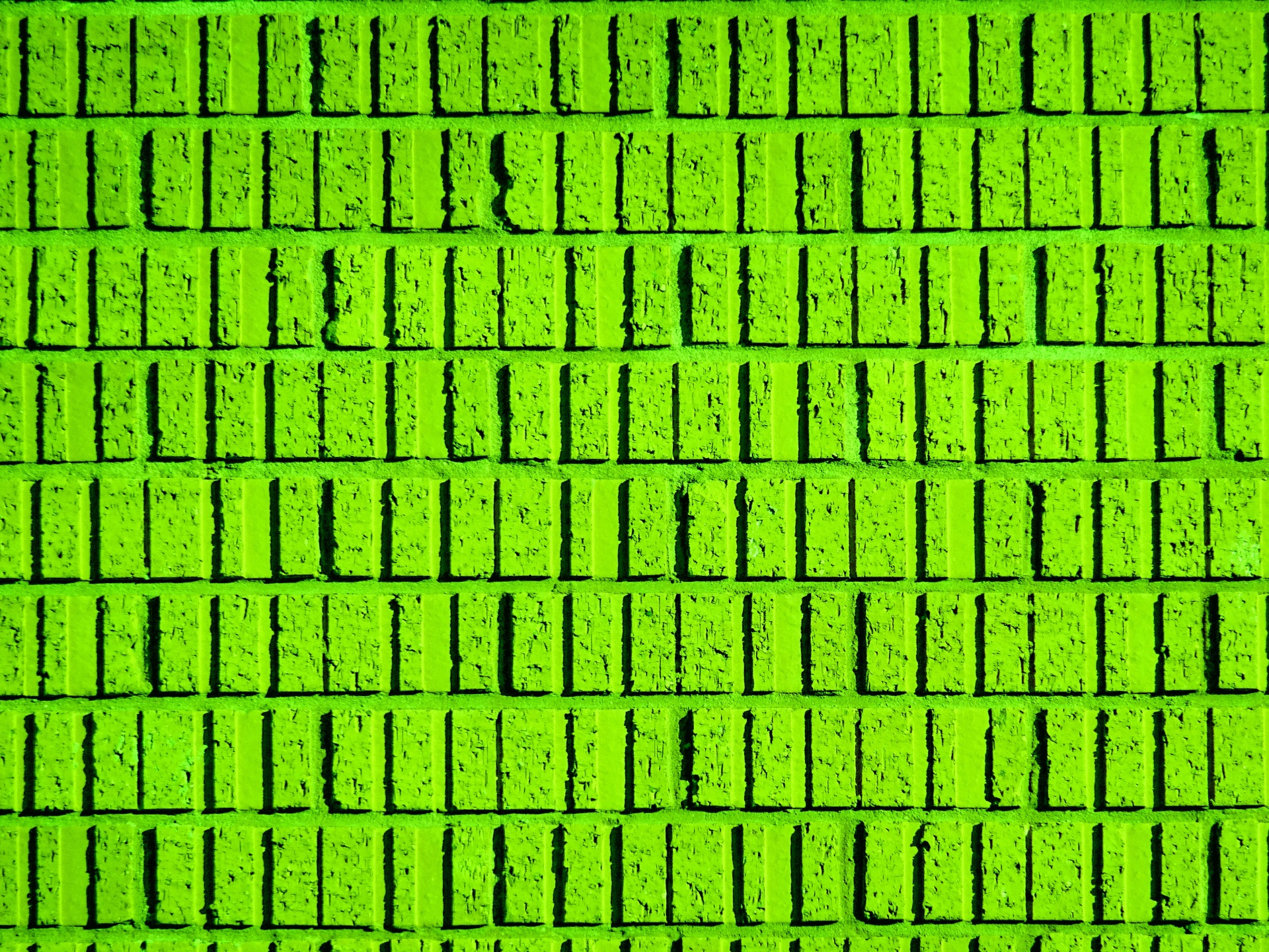 Sfondo verde muro di mattoni