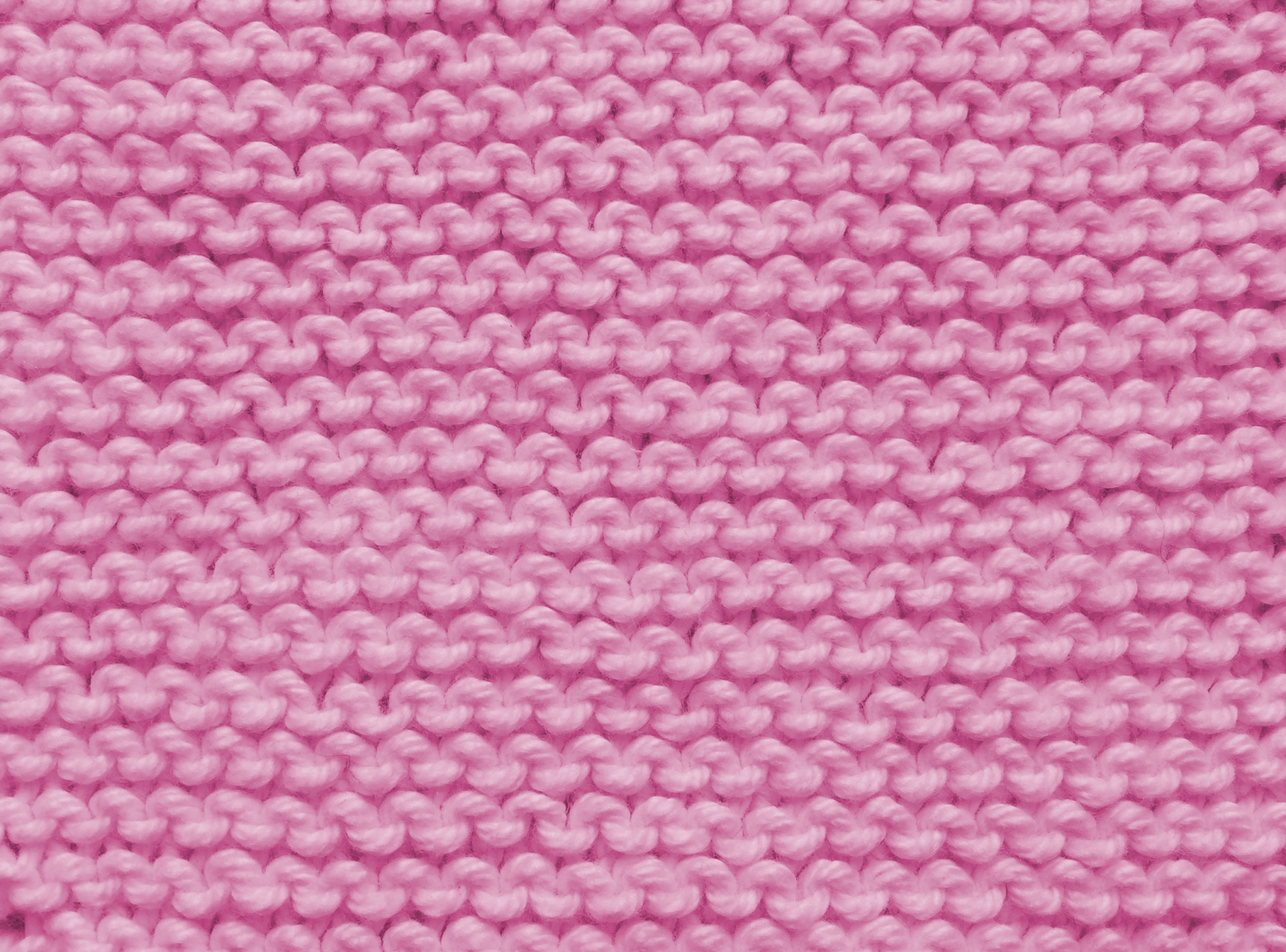 针织纹理粉红色的背景