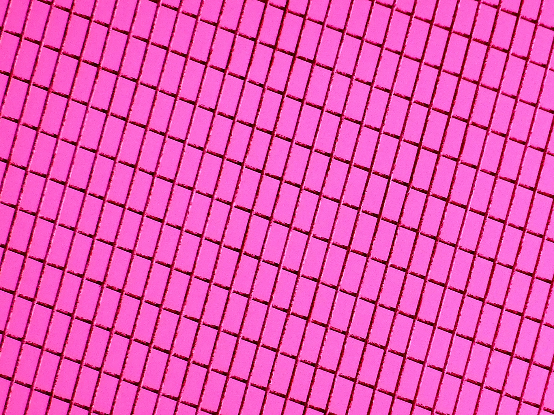 Sfondo rosa modello della rete metallica
