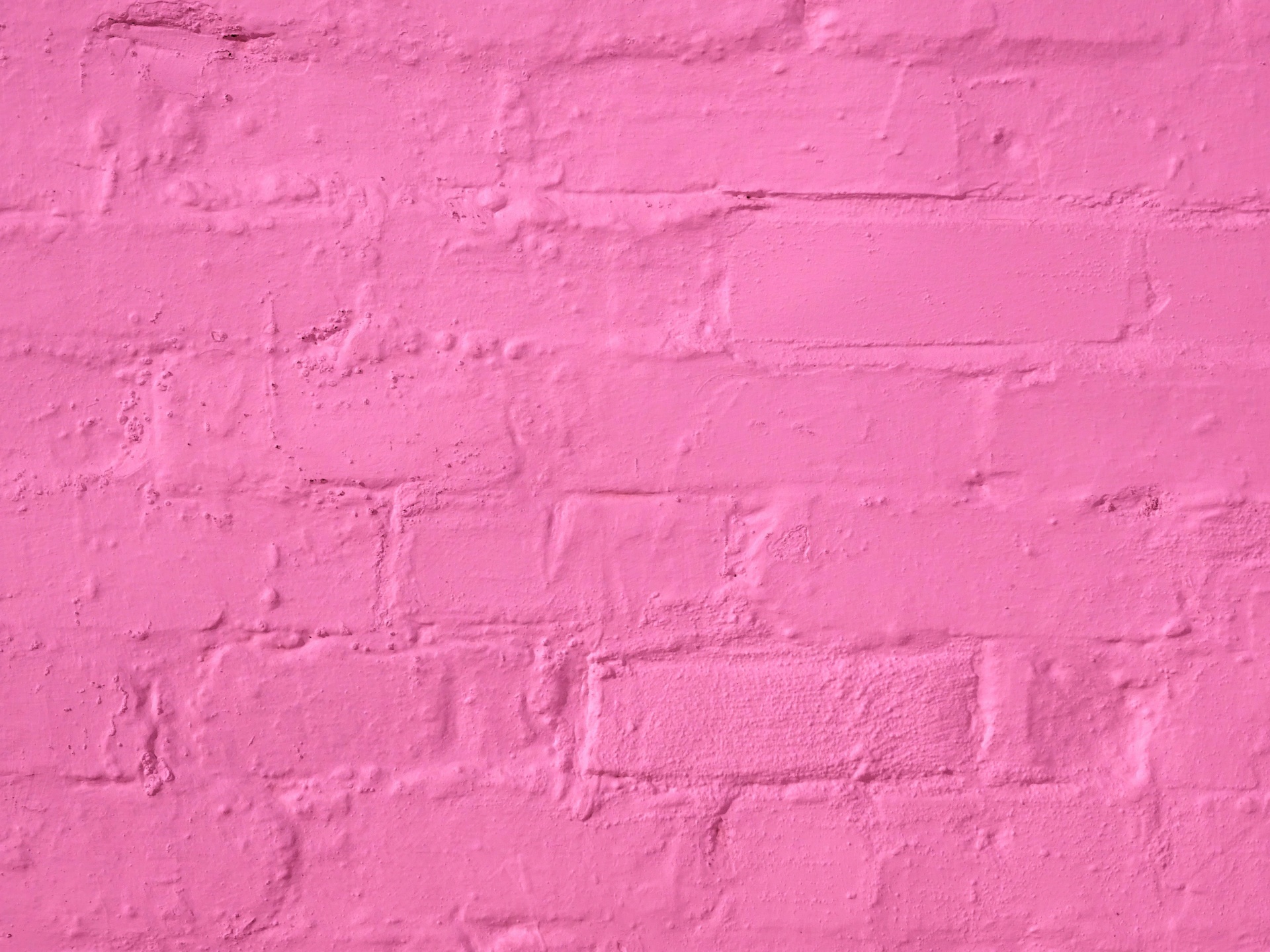 粉红色的砖背景