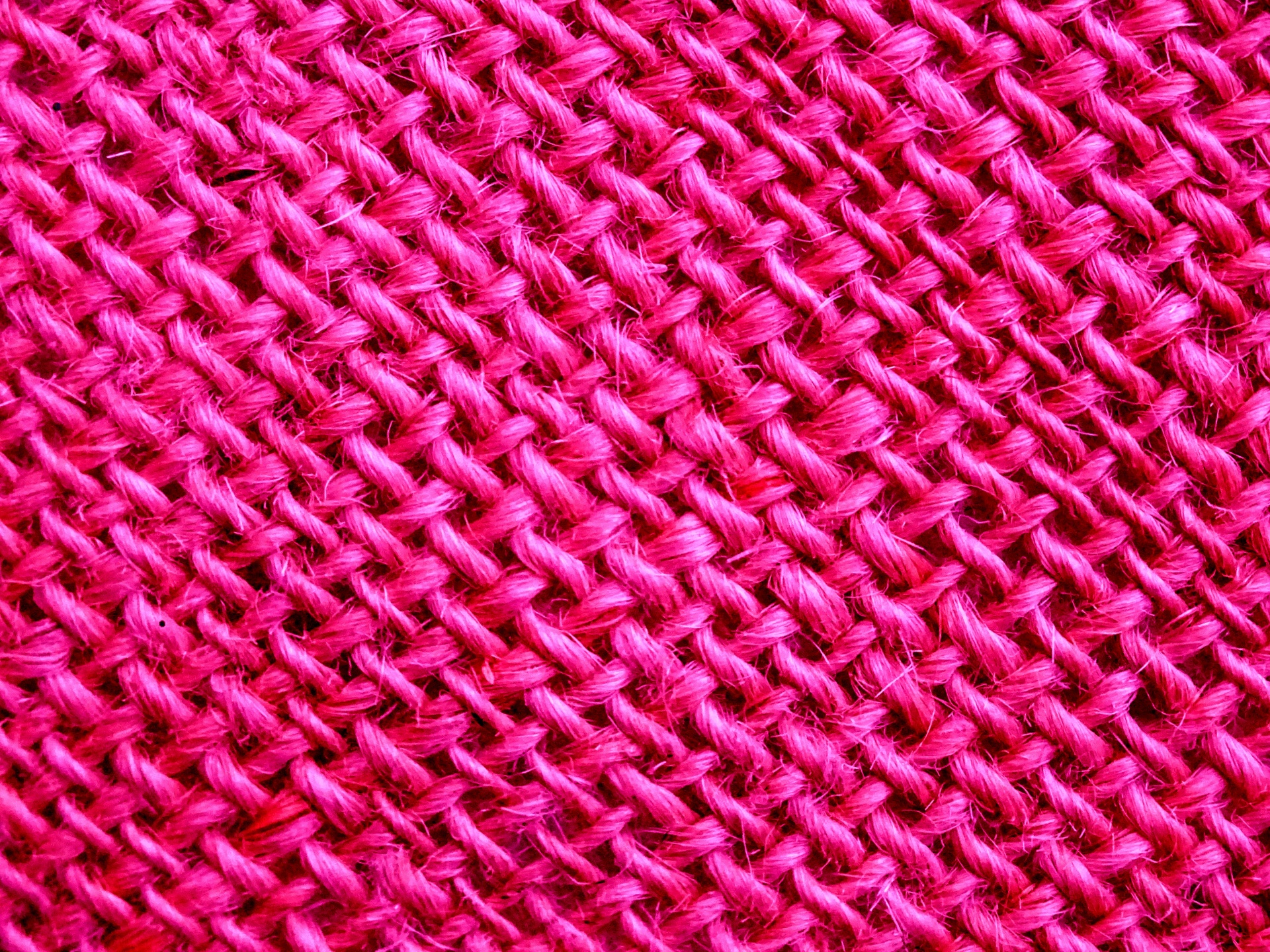 粉红色的编织绳索背景