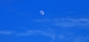 Moon In Blue Sky