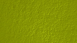 Gelbe verputzte Wand