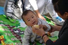 Baby Eating Fruit