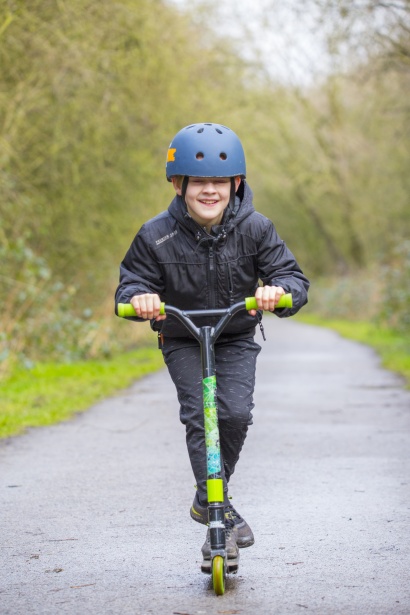 Boy On Scooter Free Stock Photo - Domain Pictures