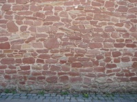 Muro di arenaria medievale irregolare