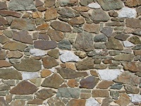 Onregelmatige middeleeuwse stenen muur