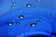 Water drops against blue background