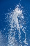 Water fountain and blue sky
