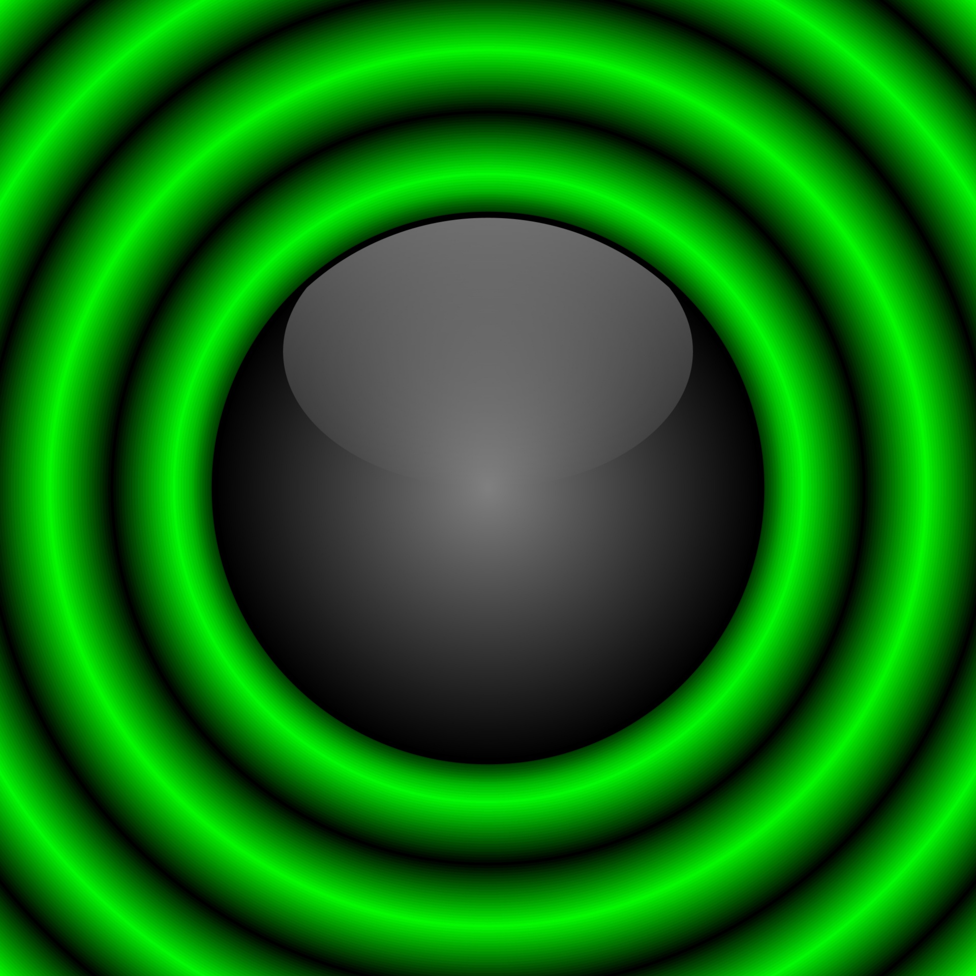 Zwarte bal met groene ringen