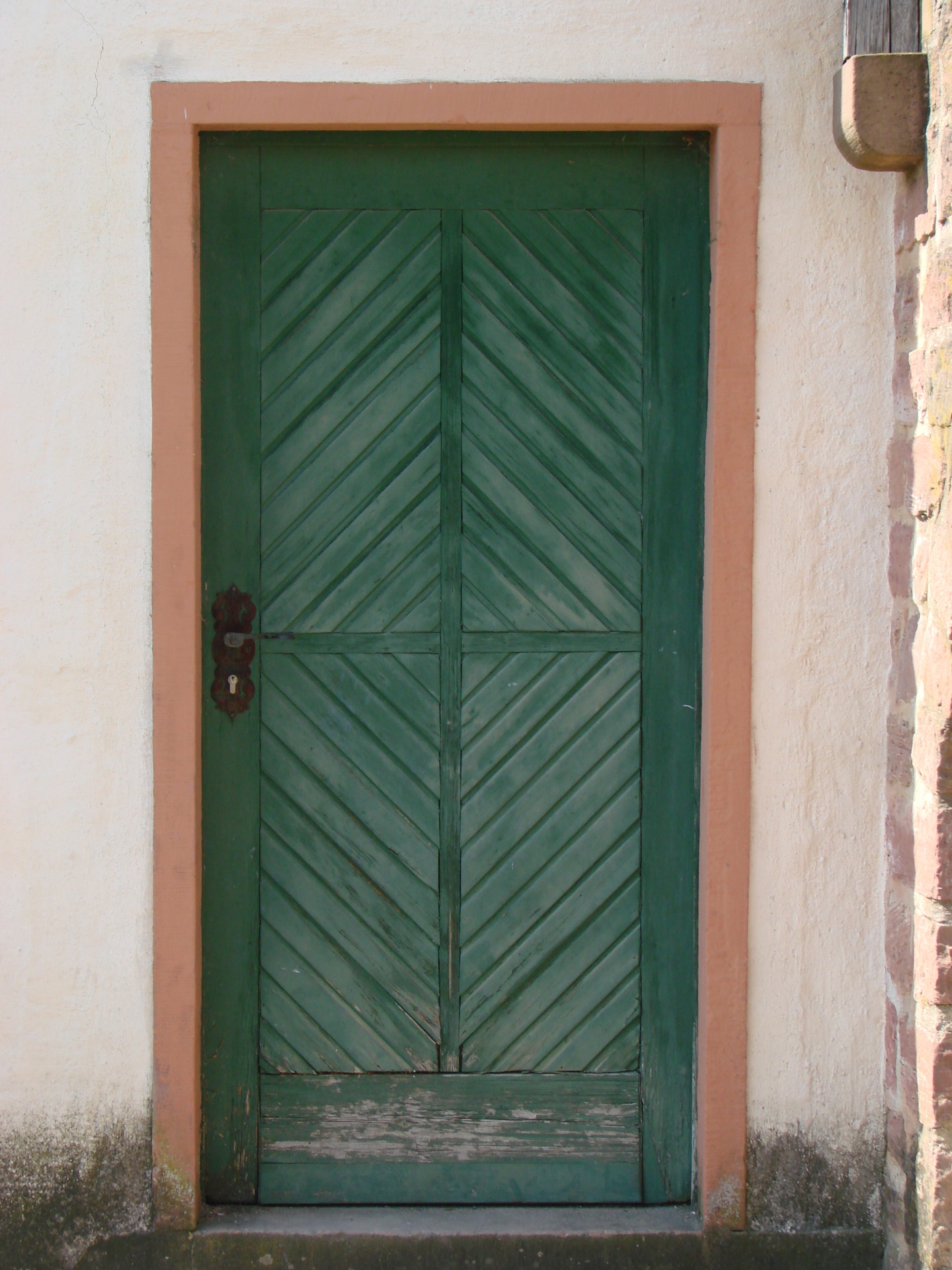Oude houten groene deur