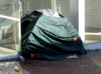Homeless Tent In Shop Doorway