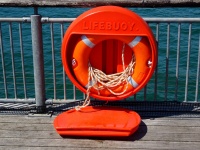 Lifebuoy On Pier Boardwalk