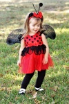Little Girl Dressed som Lady Bug