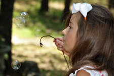 Little Girl Playing with Bubbles 2