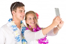 Vacation couple taking selfie