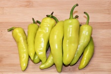 Banana Peppers on Wood Background