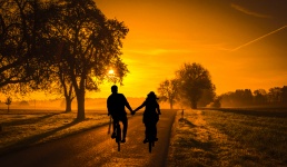 Couple riding bicycle