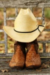 Sombrero de vaquero en botas