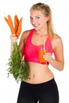Healthy Woman With Carrots