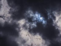 White and Dark clouds with Sun