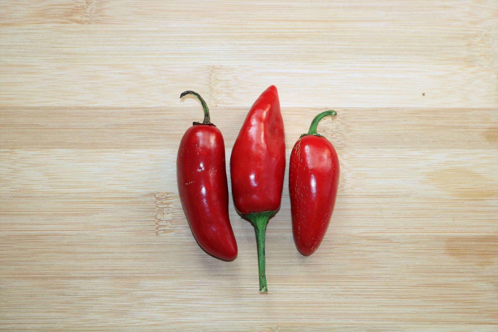 Three Red Jalapeno Peppers