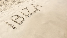 Ibiza text on a beach