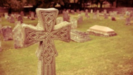 Stone cross at cemetery