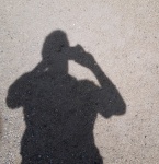Shadow Of Cell Phone Photographer