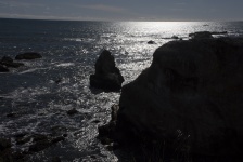 Silhouetted Ocean Rocks