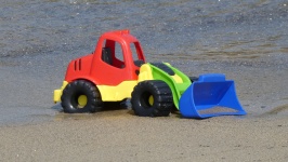 Speelgoed op het strand
