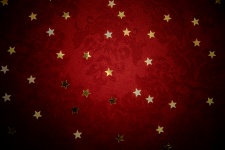 Estrelas douradas sobre fundo vermelho