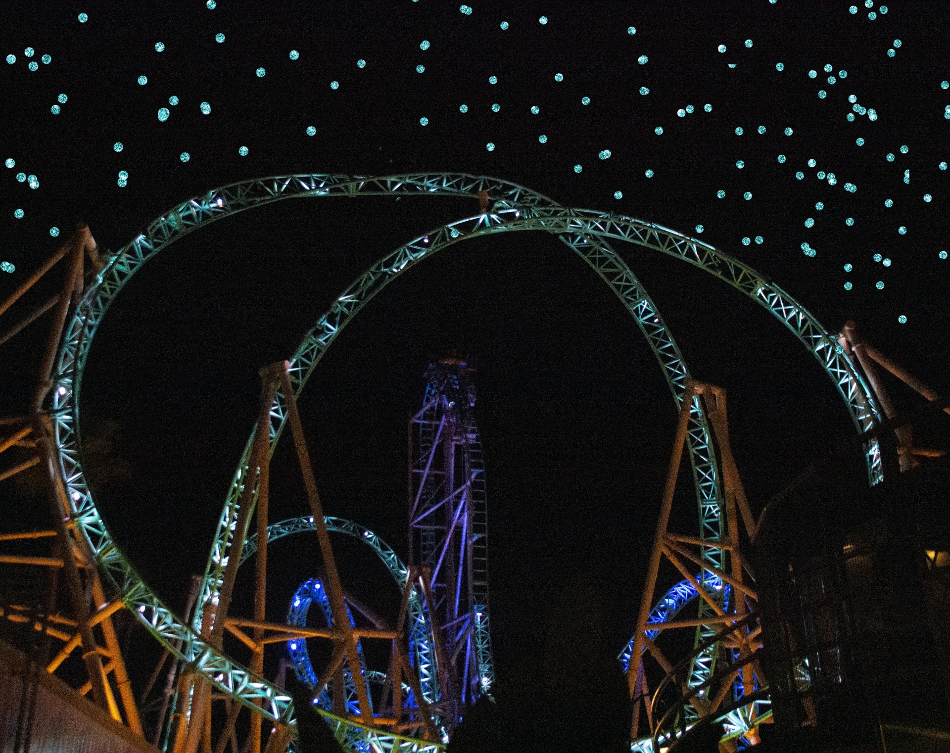 Roller Coaster Glows At Night