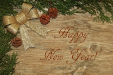 Happy New Year Gold Bow On Wood