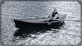 Uomo in barca a remi