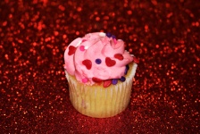 Pink Cupcake on Red Glitter