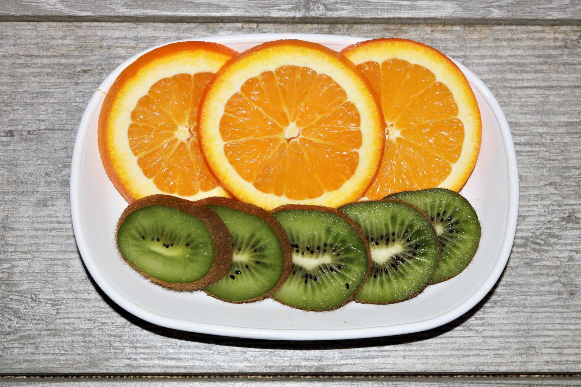 Kiwi And Orange Slices In Dish Free Stock Photo - Public Domain Pictures