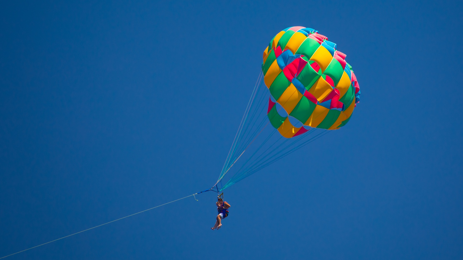 Parachute For Parasailing On Beach On A Sunny Summer Day 