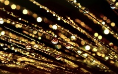 Gocce di glitter scintillanti d'oro