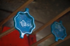 Blue painted hand valve on a train