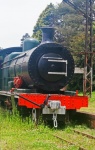 Old Steam Locomotive At A Station