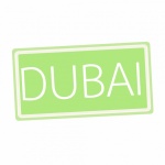 Text alb timbru din Dubai pe verde