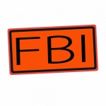 FBI black stamp text on orange